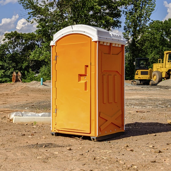 how often are the porta potties cleaned and serviced during a rental period in Belle